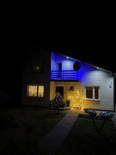 Dom z gwiazdą ModoStar i iluminacją